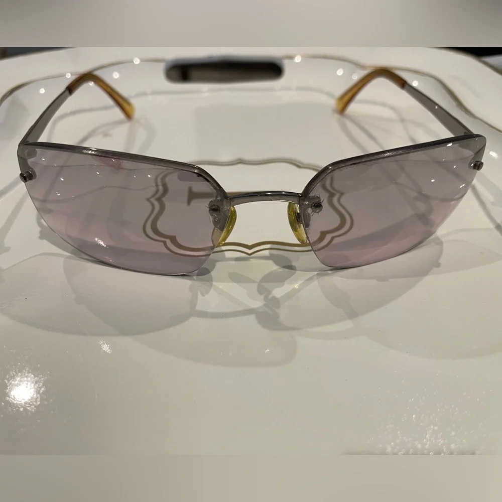 Coach Gold and Gray Sunglasses Rimless Design